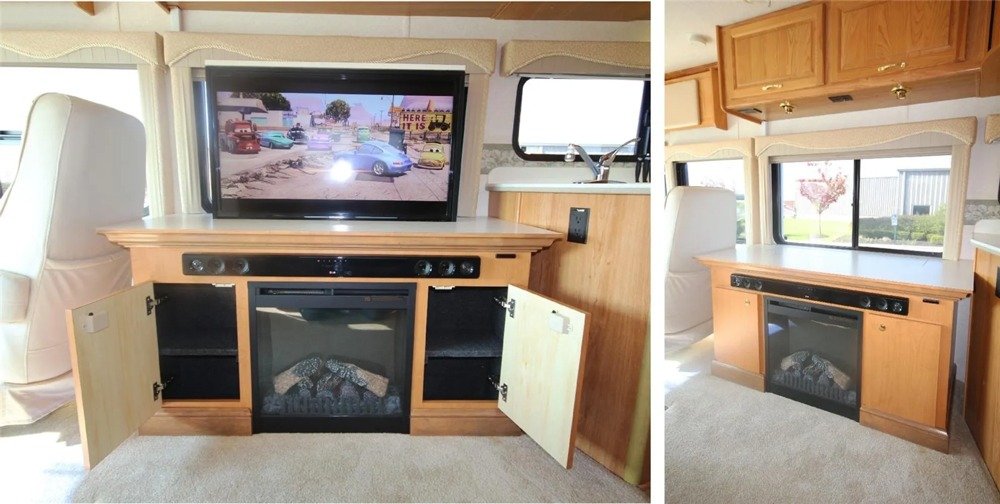 Completed RV media-center project showing a mounted television and fireplace cabinet